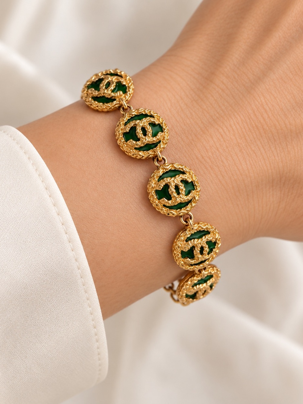 Gold-Tone Bracelet with Green Enamel Coin Accents